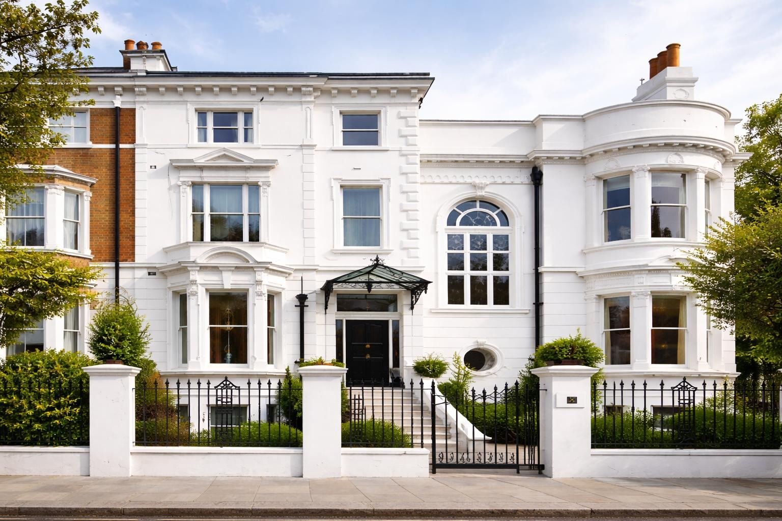 Pale blue Georgian terrace exterior in London